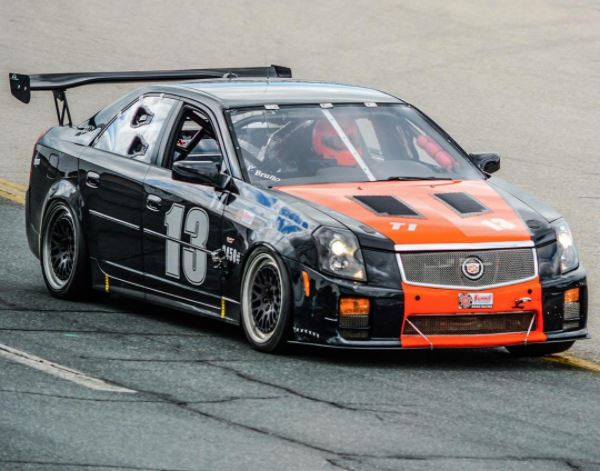 Divisor de viento delantero de fibra de carbono APR (Cadillac CTS-V Sedán 2004-2007)