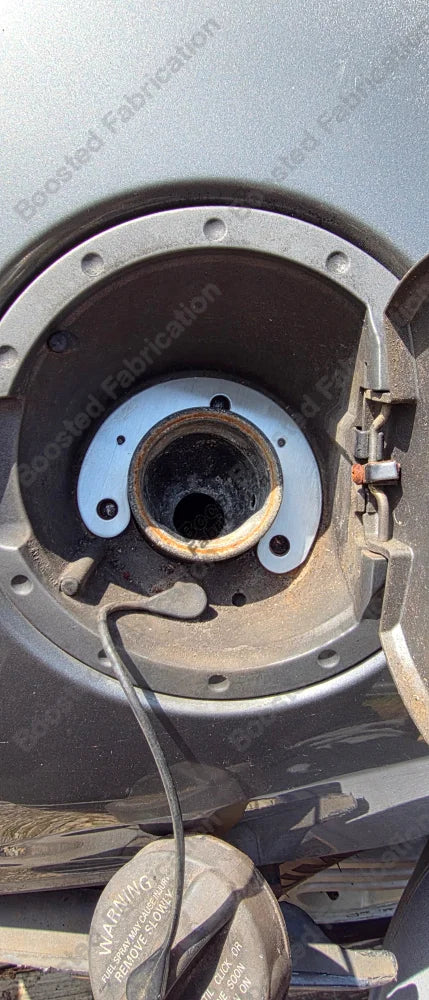Embellecedor de puerta de combustible de acero inoxidable Eclipse 2000-2005 de Boosted Fabrication
