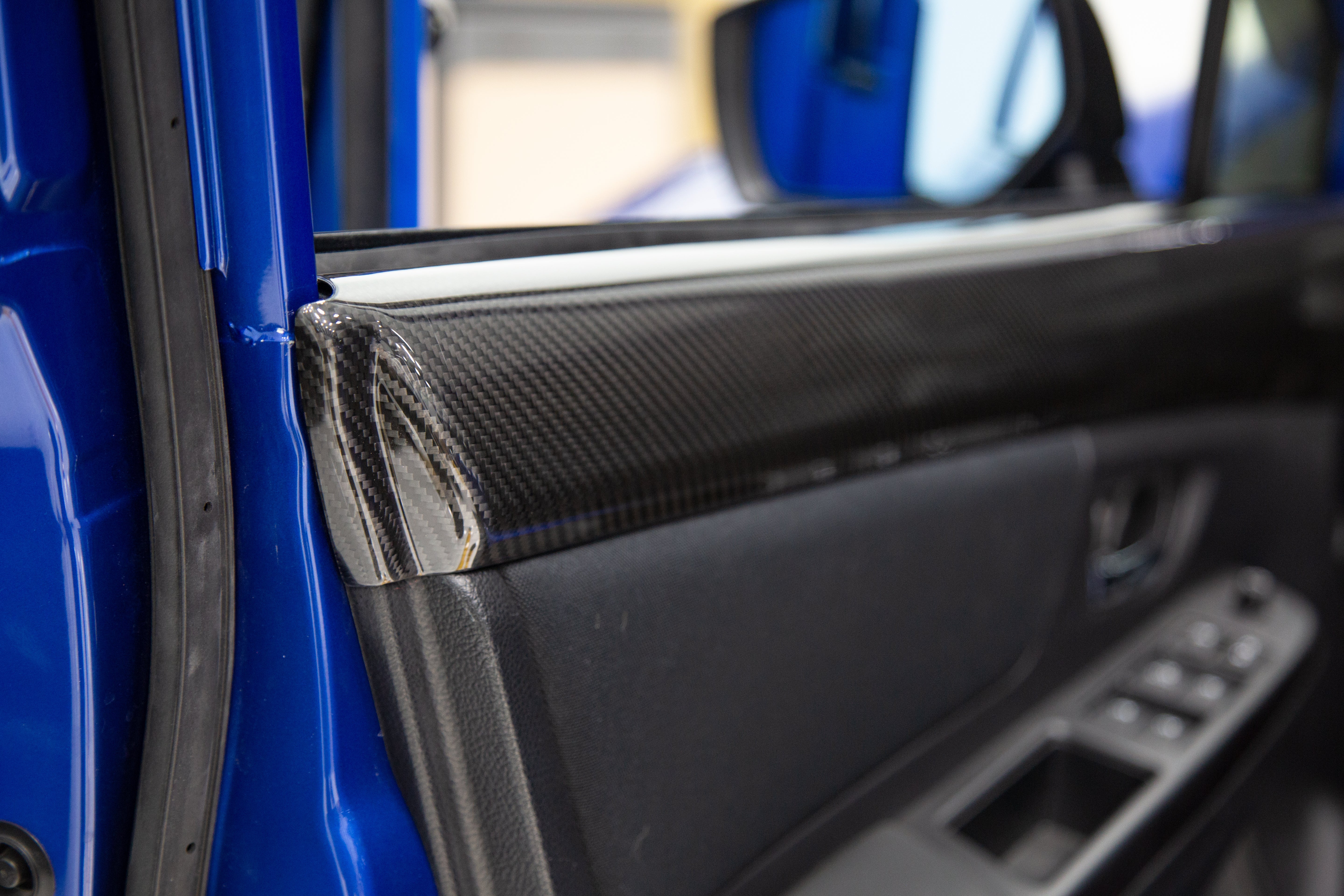 OLM LE Dry Carbon Front Door Trim Upper Panels - 15+ WRX / STI