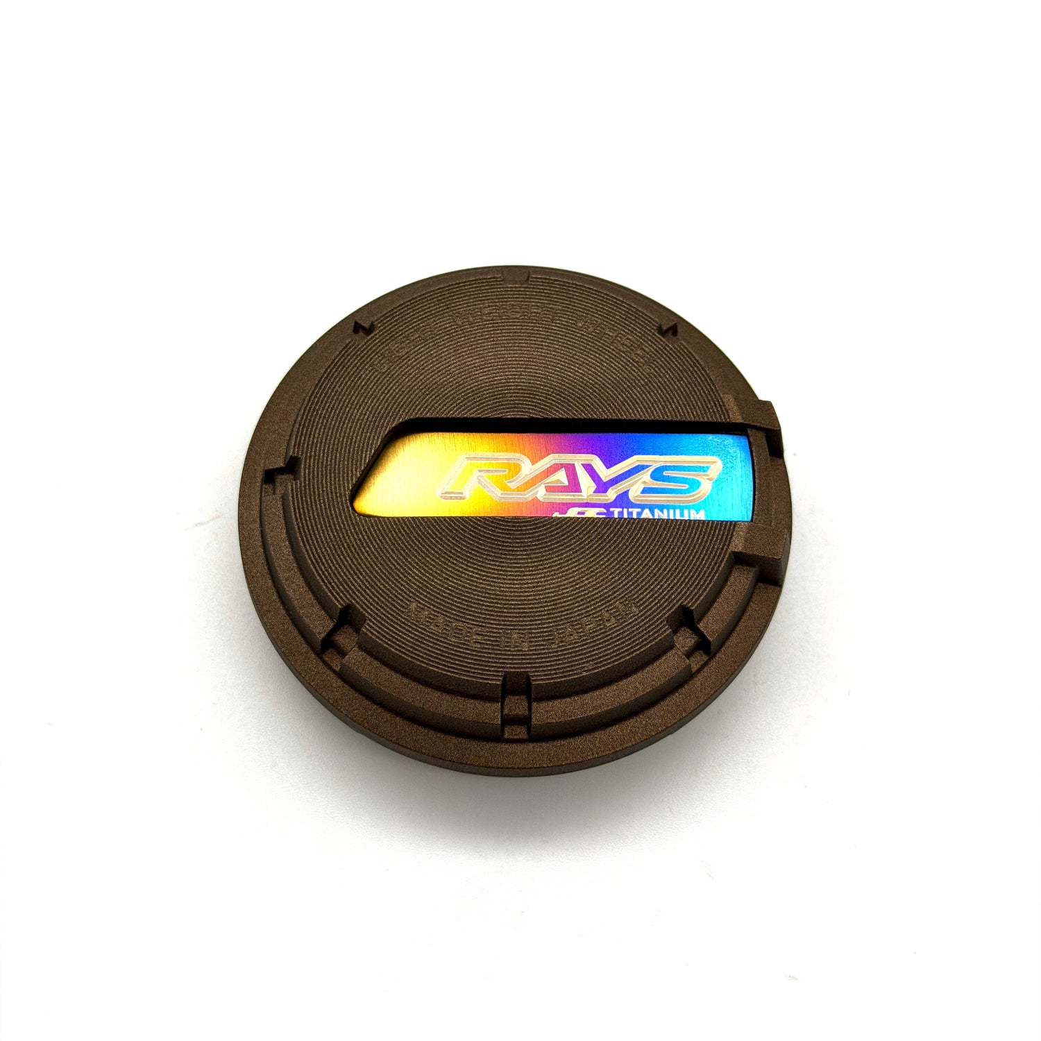 Rays wheel center cap with JDC Titanium plaque insert finished in a burnt gradient anodized color with Rays and JDC Titanium logo.