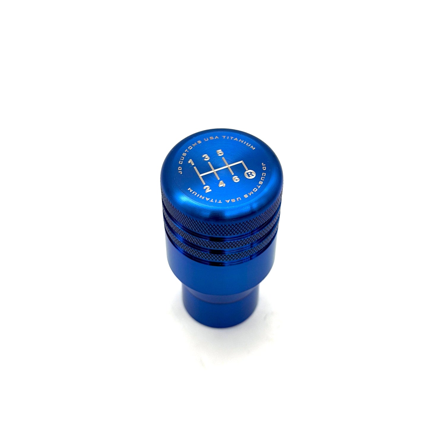 Blue gear shift knob on a white background