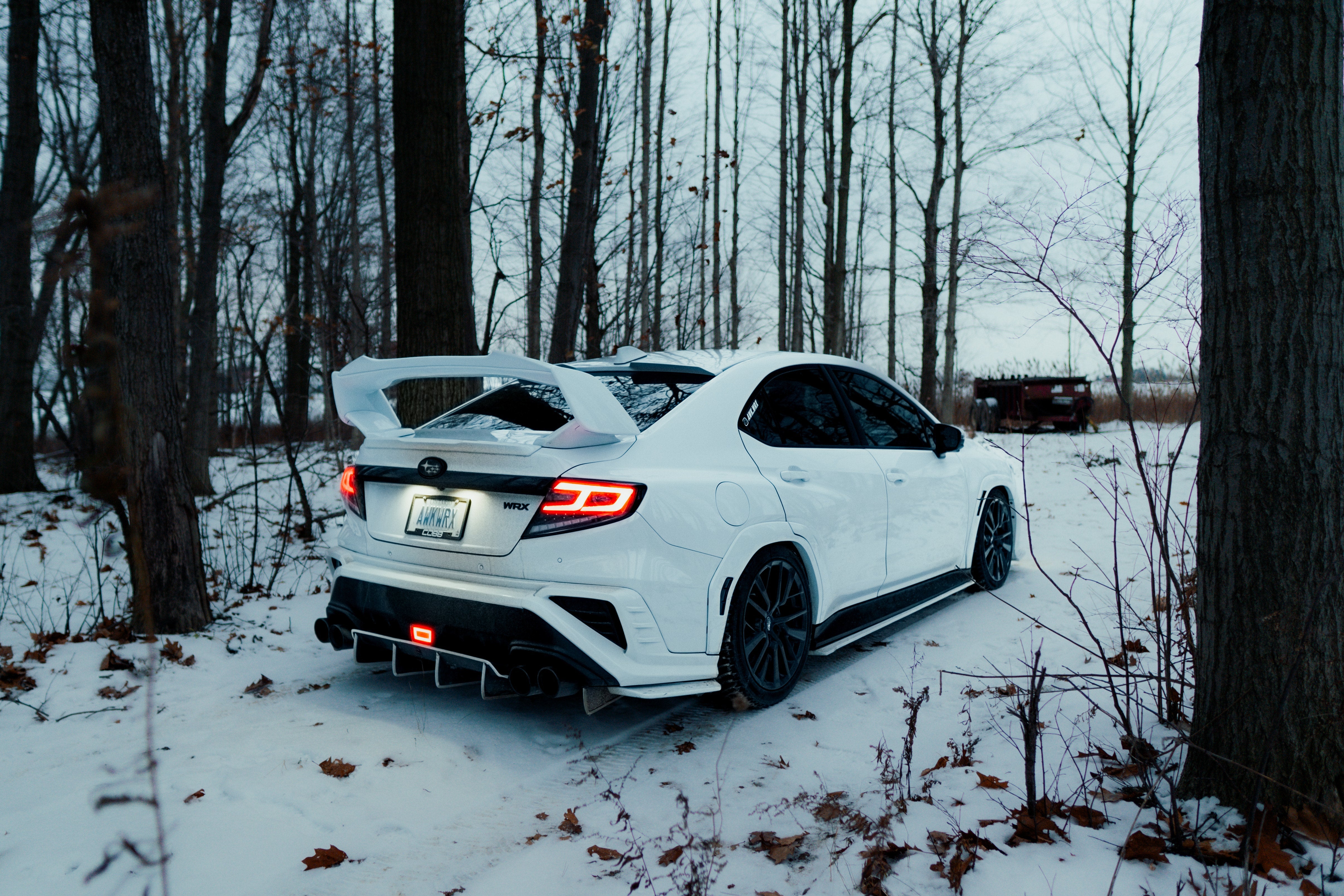 Luces traseras LED OLM Spec-AR (lente transparente/base negra/barra blanca) - WRX 2022+