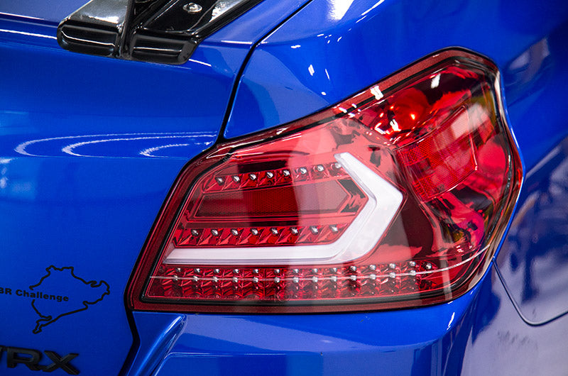 Luces traseras OLM Evolution - Lente transparente, base roja, barra blanca - Subaru WRX/STI 2015-2021