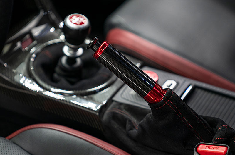 OLM Signature Series Ebrake Handle (Black Carbon w/Red) - 2015-2021 WRX & STI / 2013-2022 FR-S / BRZ / 86 / 2014-2018 Forester / 2013+ *Crosstrek