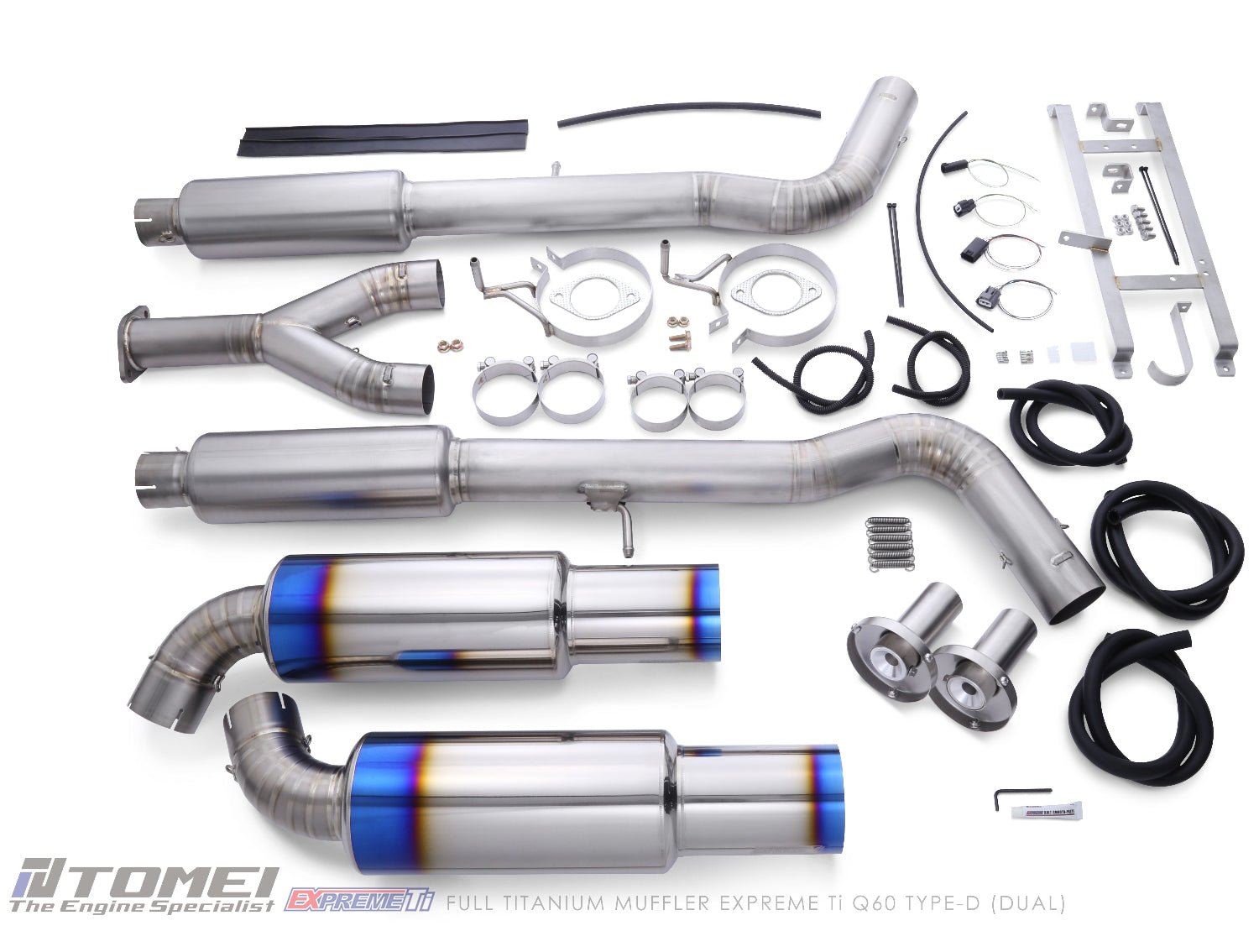 Tomei exhaust system components on a white background