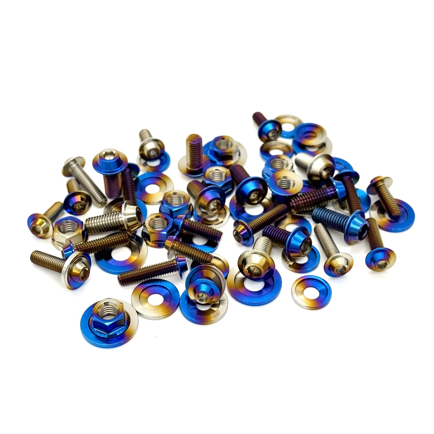 burnt titanium screws, bolts, and nuts on a white background