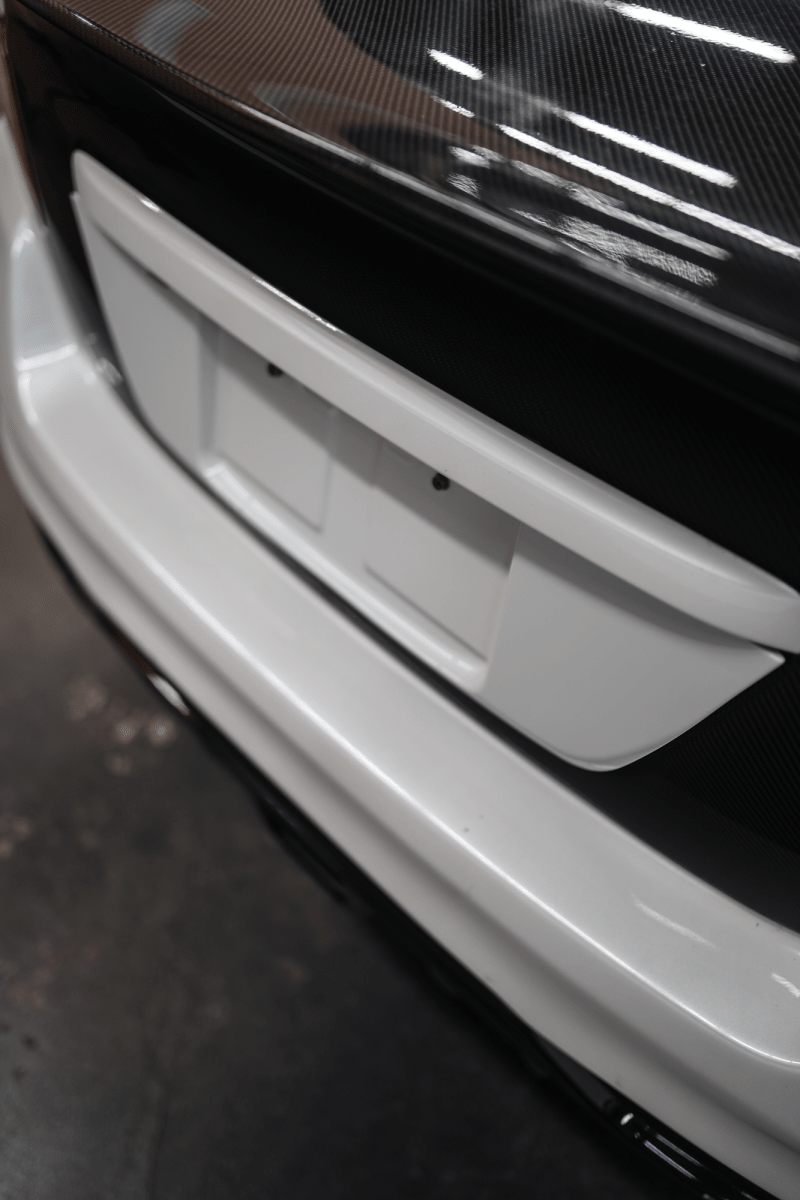 Respaldo para matrícula JDMuscle en negro brillante con pintura a juego (Subaru WRX/STI 15-21)