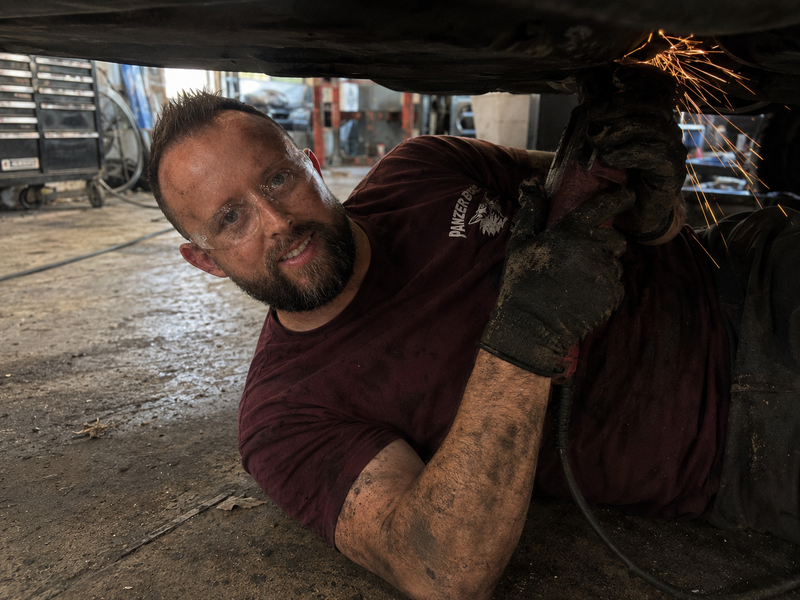 Jon Smith Cutting Exhaust Off Of Car