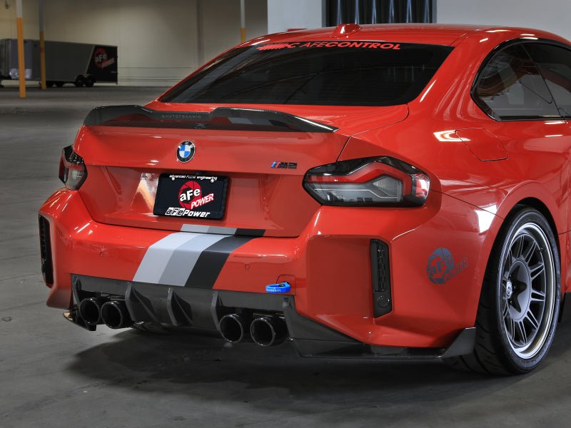 Orange BMW M5 Sedan With AFE Power License Plate