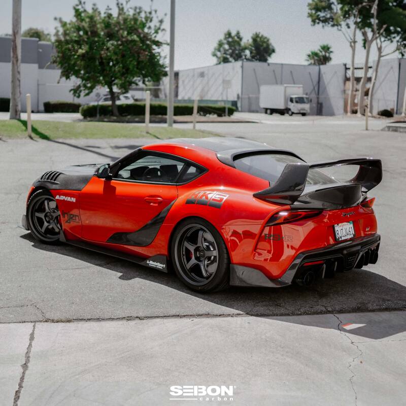 Red MK5 Supra With Carbon Wing, Hood, And Accents