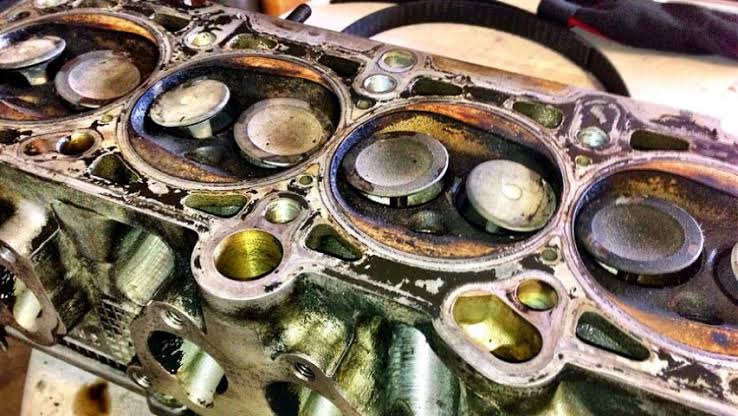 Headless Engine Showing Burnt Pistons and Valves