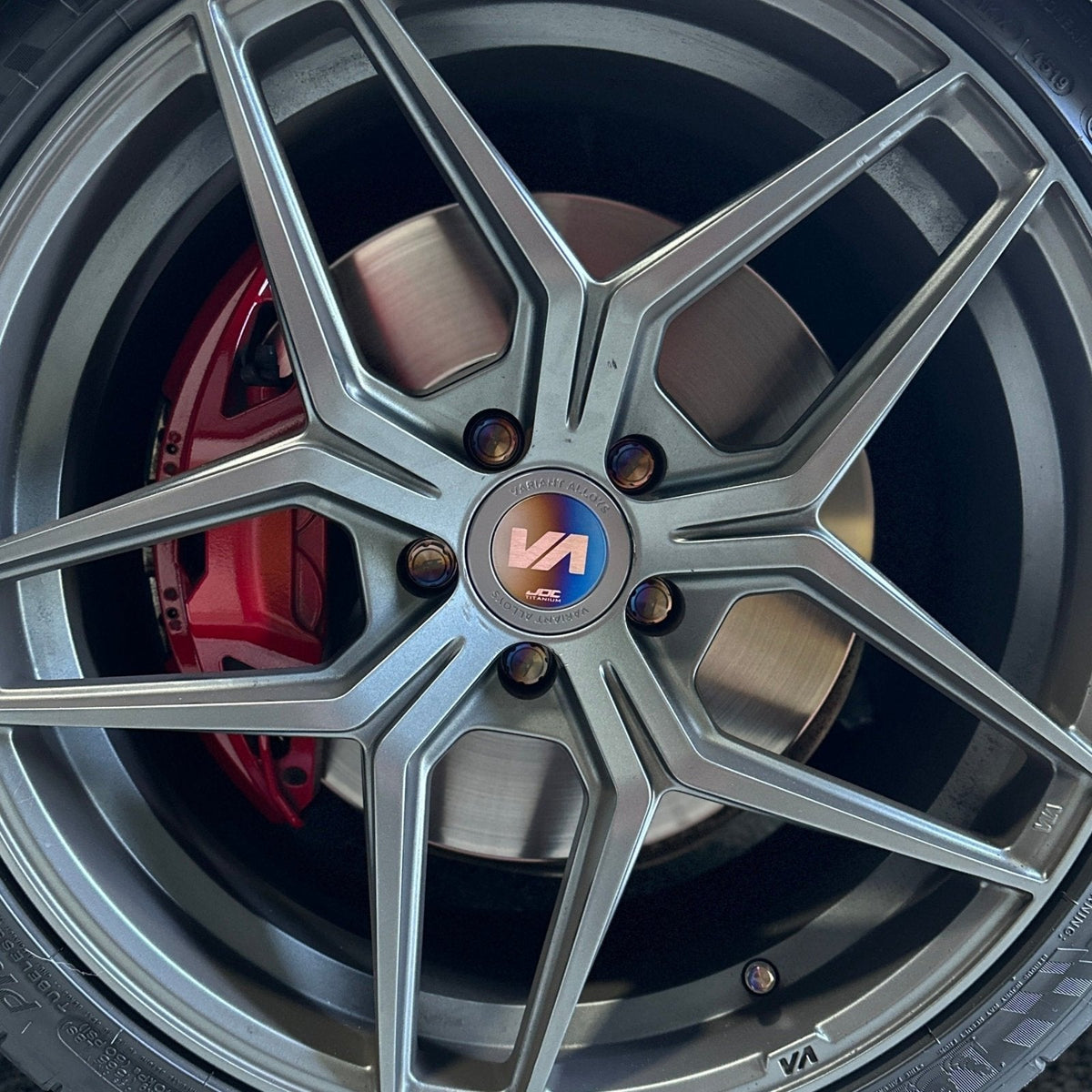 Close Up Of Varient Wheel With Titanium Center Cap Plaque