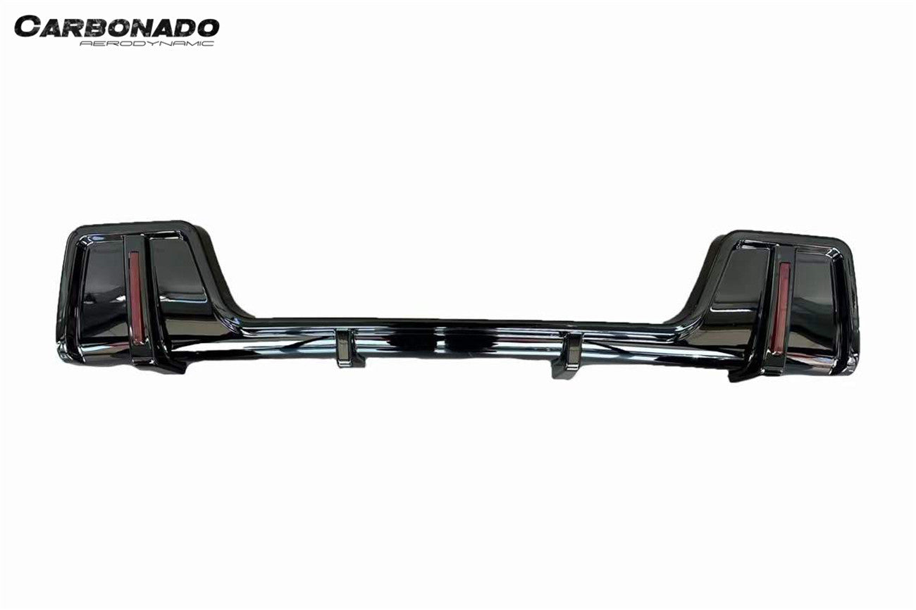 Carbonado 2020-2024 Land Rover Defender Rock Style Rear Lip & with LED Light