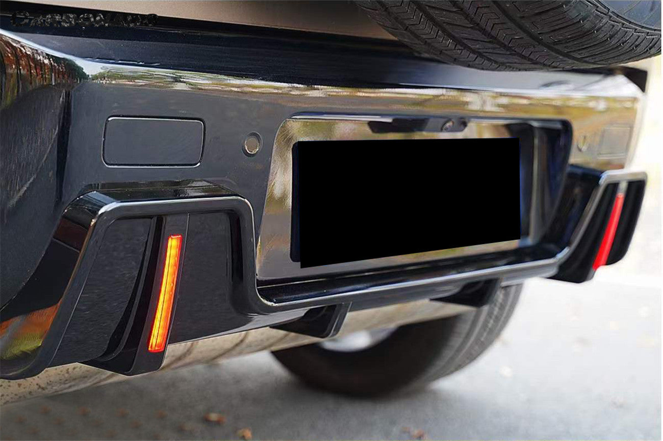 Carbonado 2020-2024 Land Rover Defender Rock Style Rear Lip & with LED Light