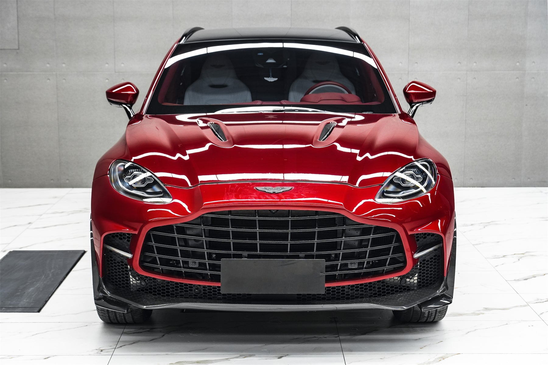 Carbonado 2021-2024 Aston Martin DBX 707 Style Dry Carbon Fiber Front Bumper With Lights