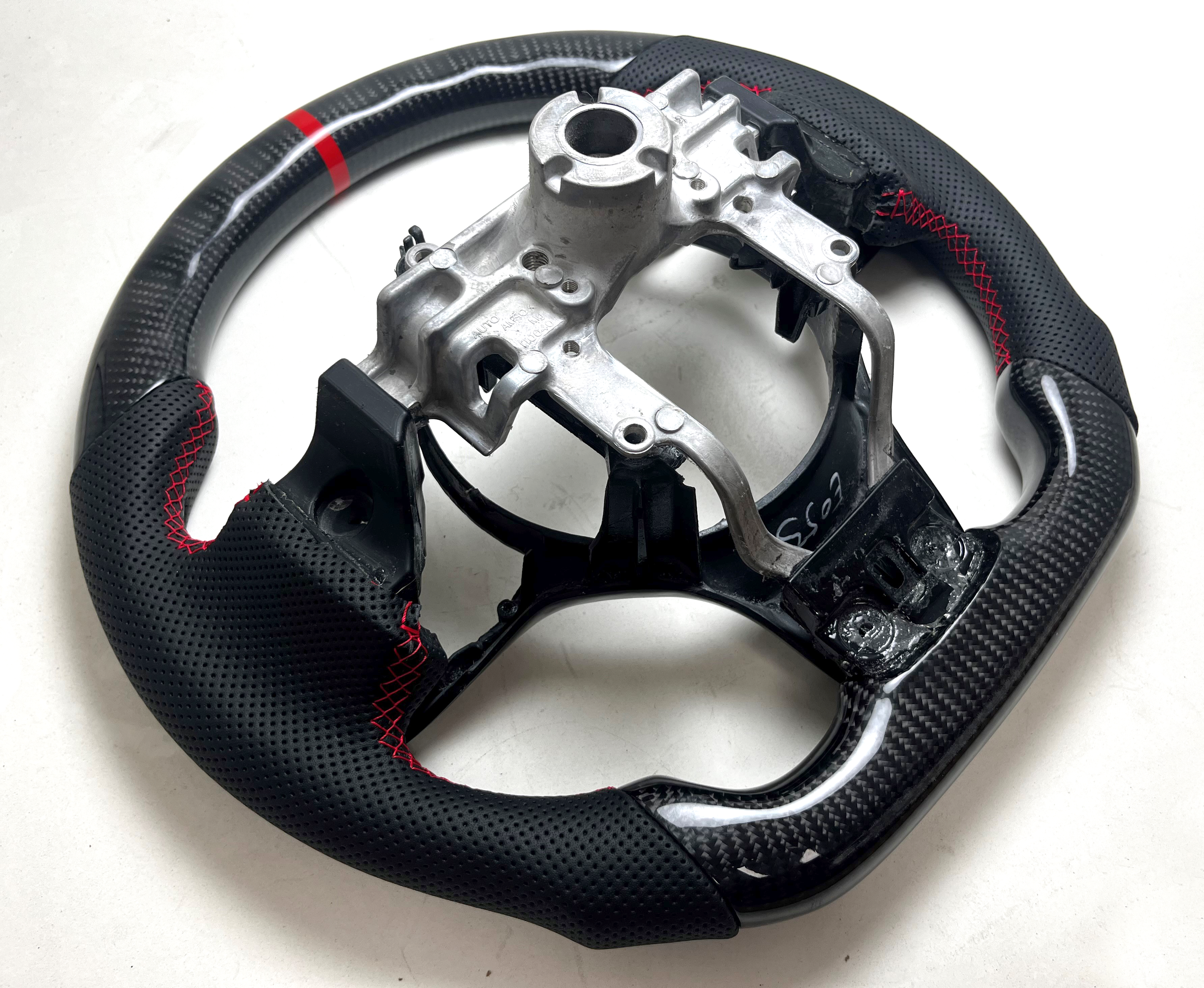 Volante de fibra de carbono Prosport Mitsubishi EVO X (opción 2)