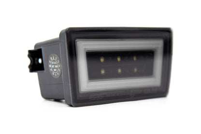 Luz de freno trasera OLM NB+R F1 (lente ahumada, base negra brillante, barra blanca) - WRX/STI 15+