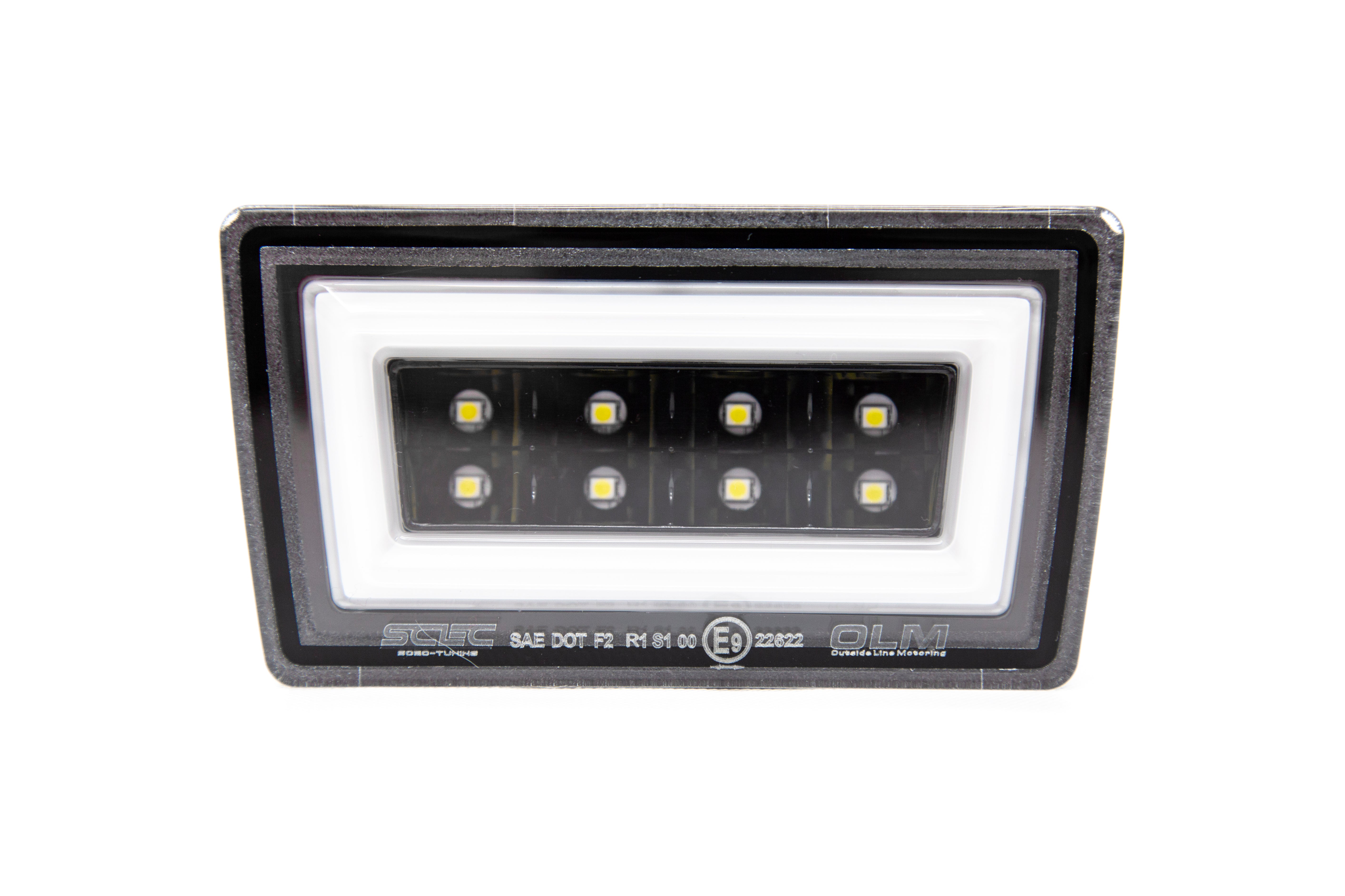 Luz de freno trasera OLM NB+R F1 (lente transparente, base negra brillante, barra blanca) - WRX/STI 15+