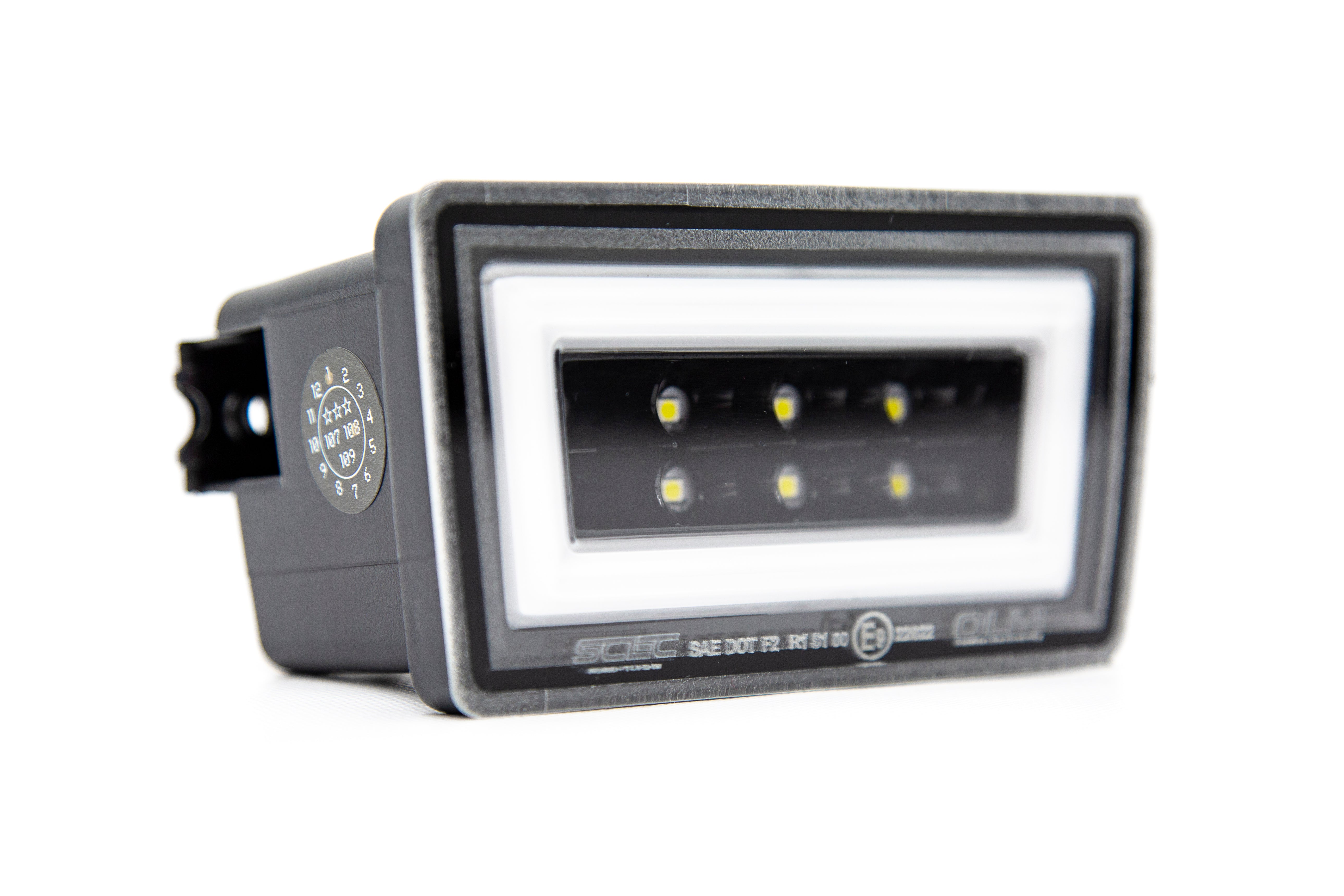 Luz de freno trasera OLM NB+R F1 (lente transparente, base negra brillante, barra blanca) - WRX/STI 15+