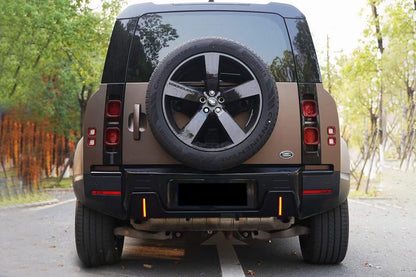 Carbonado 2020-2024 Land Rover Defender Rock Style Rear Lip & with LED Light