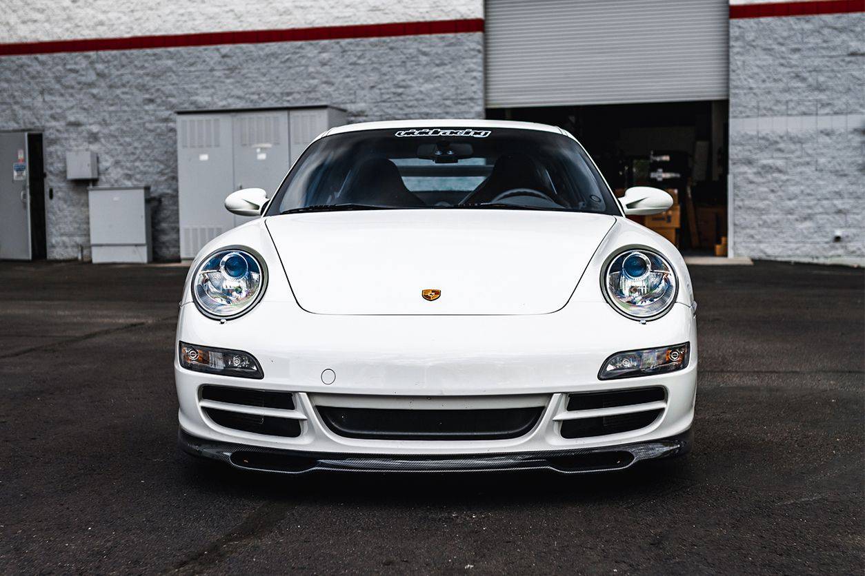 Carbonado 2005-2008 Porsche 911 997.1 Carrera S EM Style Carbon Fiber Front Lip