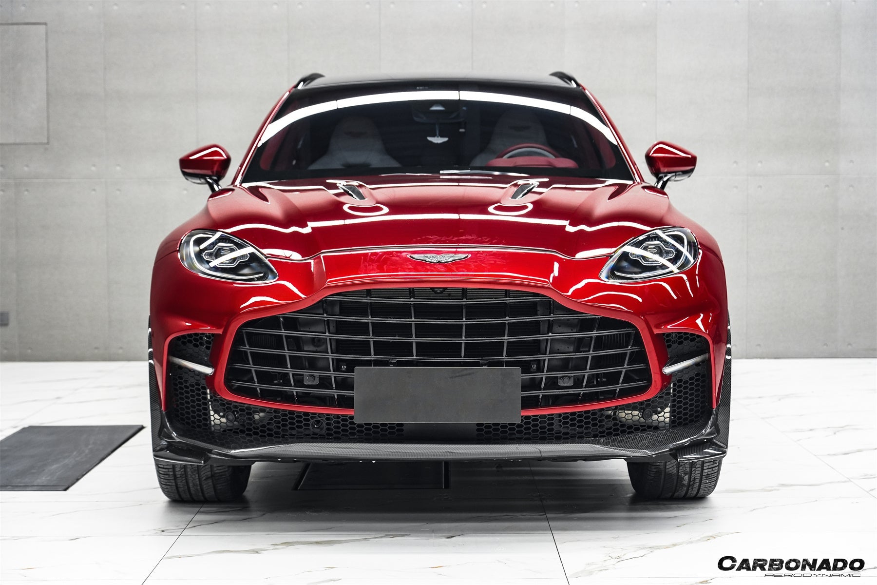 Carbonado 2021-2024 Aston Martin DBX 707 Style Dry Carbon Fiber Front Bumper With Lights