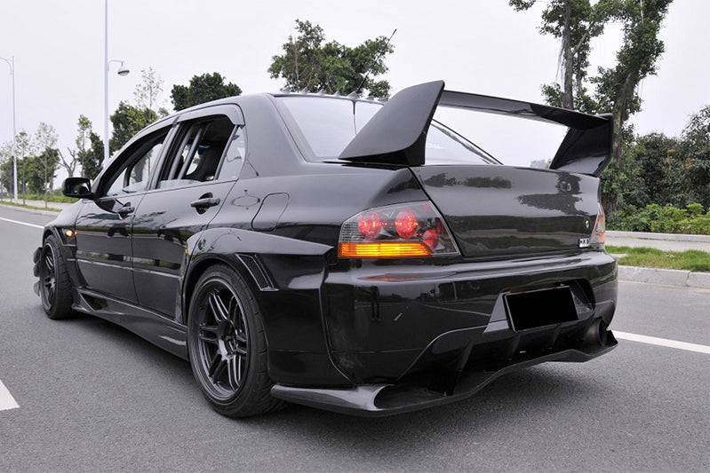 Carbonado JDM Style Rear Bumper | 2003-2006 Mitsubishi Evo 7/8/9 - 1