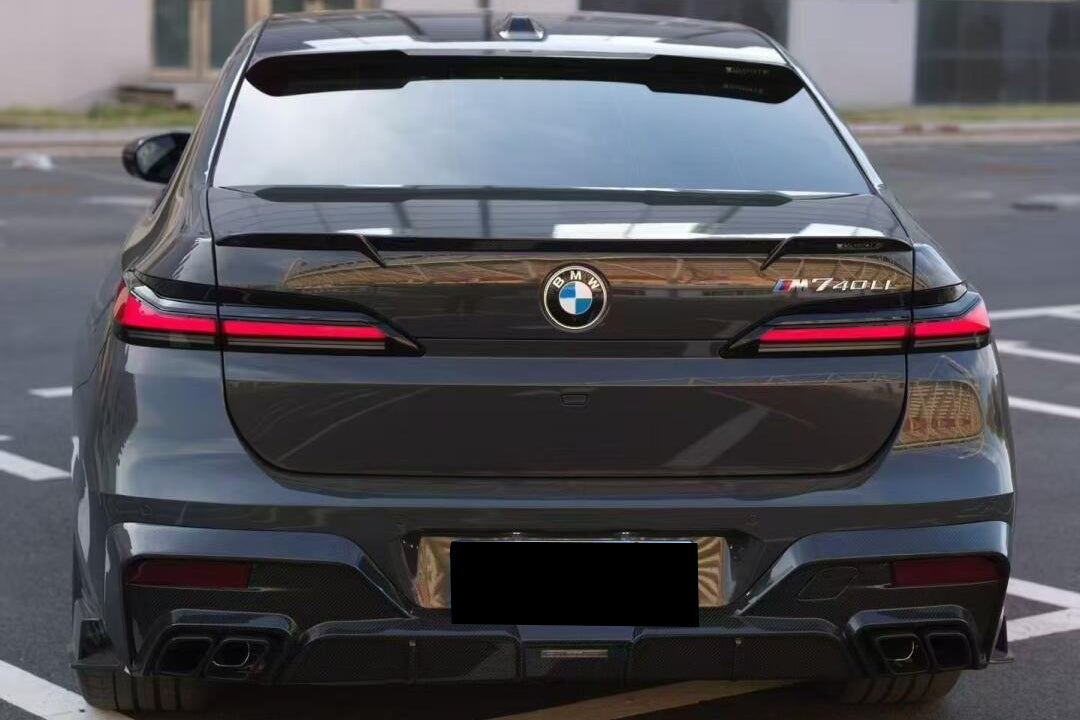 2022-2026 BMW 7 Series G70 Autoclave Carbon Fiber Rear Diffuser Lip with exhaust tips Carbonado (MSY) Fits: M Sport Package only (DRYCFG70-OD-MSY-RD)