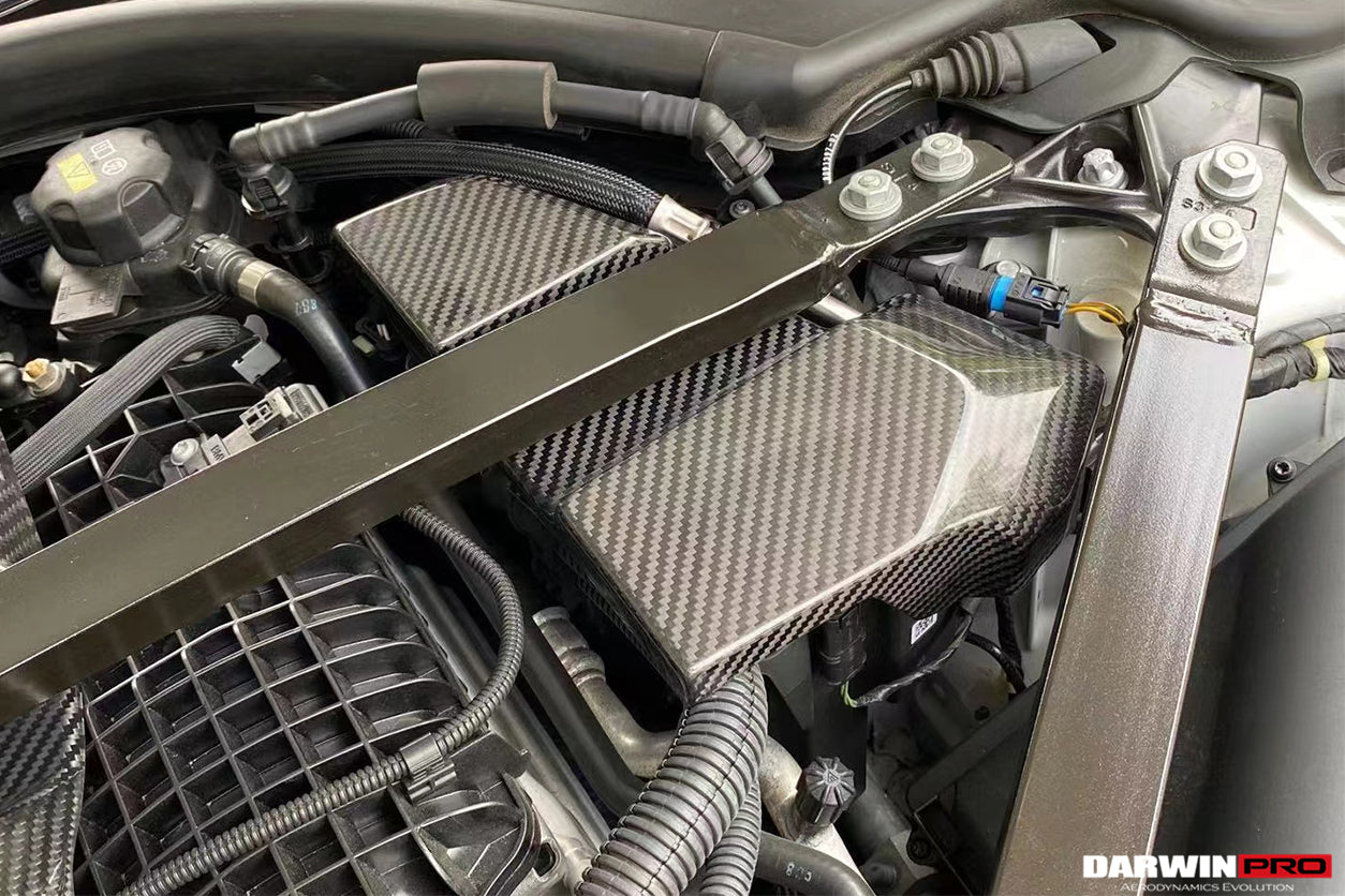 Cubierta de fusibles de fibra de carbono seca DarwinPRO para BMW M3, G80, M4, G82 y G83 (2021 en adelante)