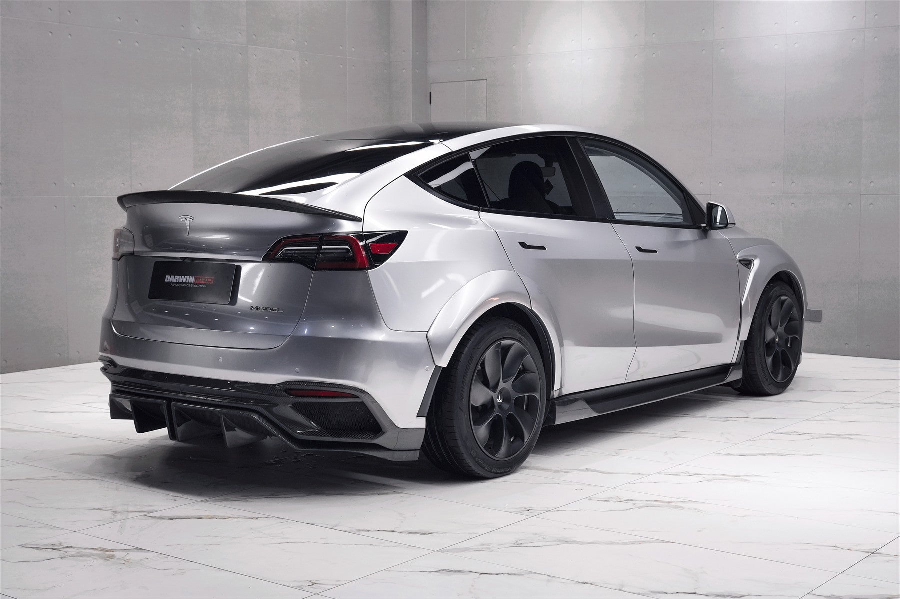 Parachoques trasero de fibra de carbono DarwinPRO 2020-2024 Tesla Model Y IMPII Performance Part