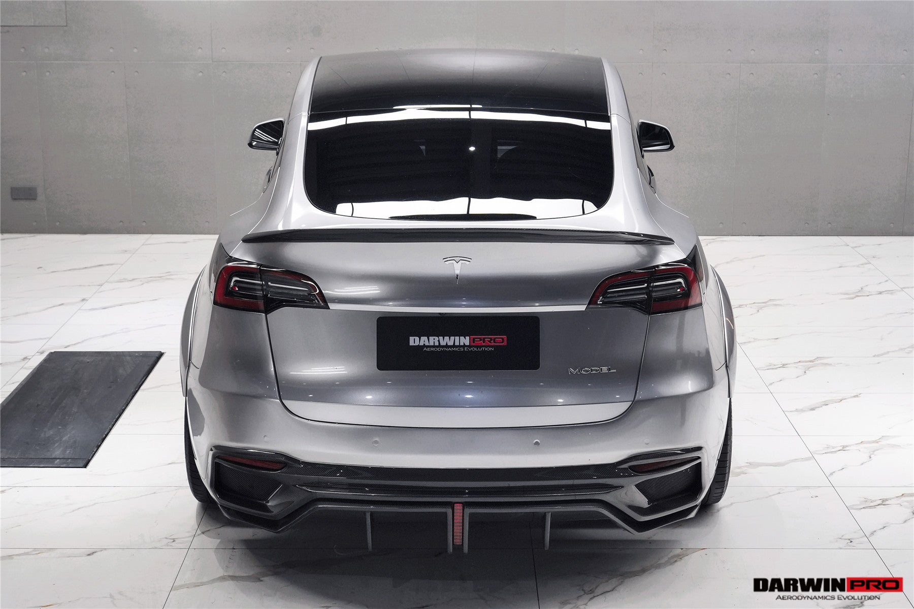 Parachoques trasero de fibra de carbono DarwinPRO 2020-2024 Tesla Model Y IMPII Performance Part