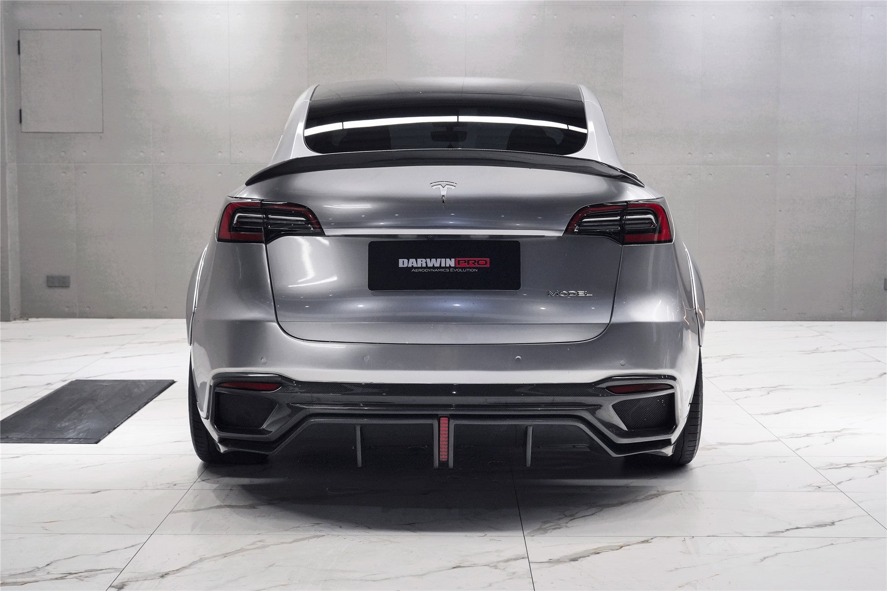 Parachoques trasero de fibra de carbono DarwinPRO 2020-2024 Tesla Model Y IMPII Performance Part