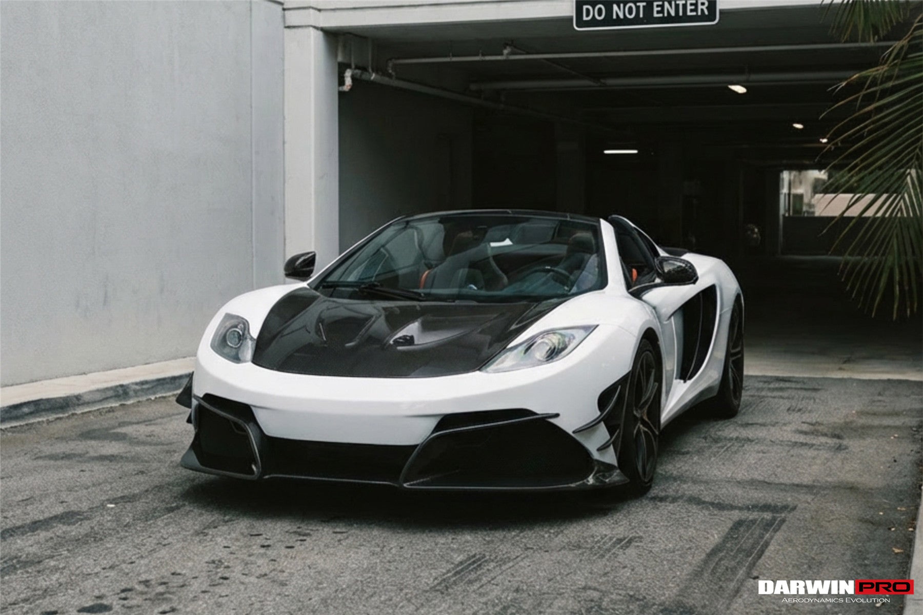Parachoques delantero DarwinPRO Rebel Performance Style de fibra de carbono parcial con borde | McLaren MP4, 12C (2011-2014)