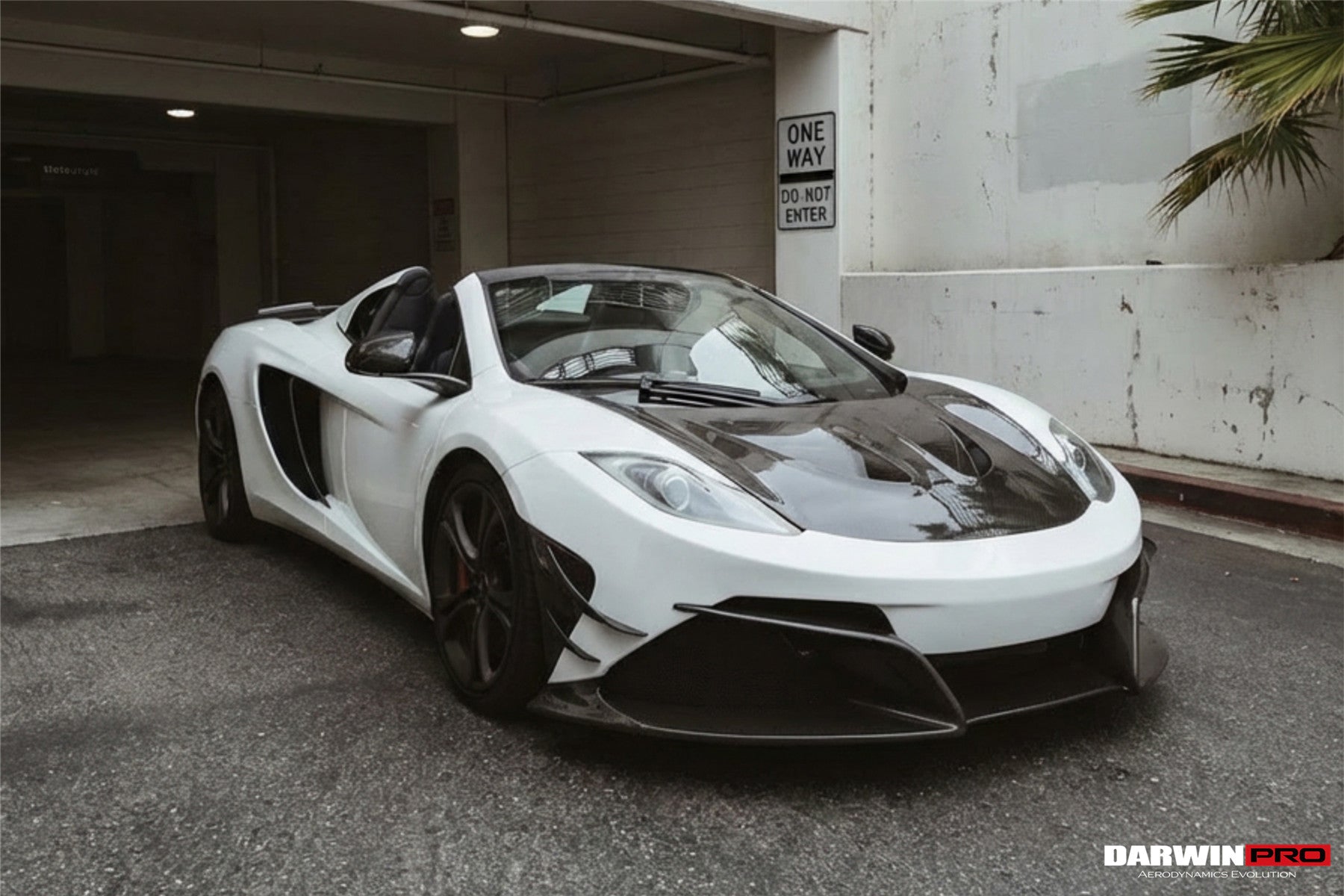 Parachoques delantero DarwinPRO Rebel Performance Style de fibra de carbono parcial con borde | McLaren MP4, 12C (2011-2014)