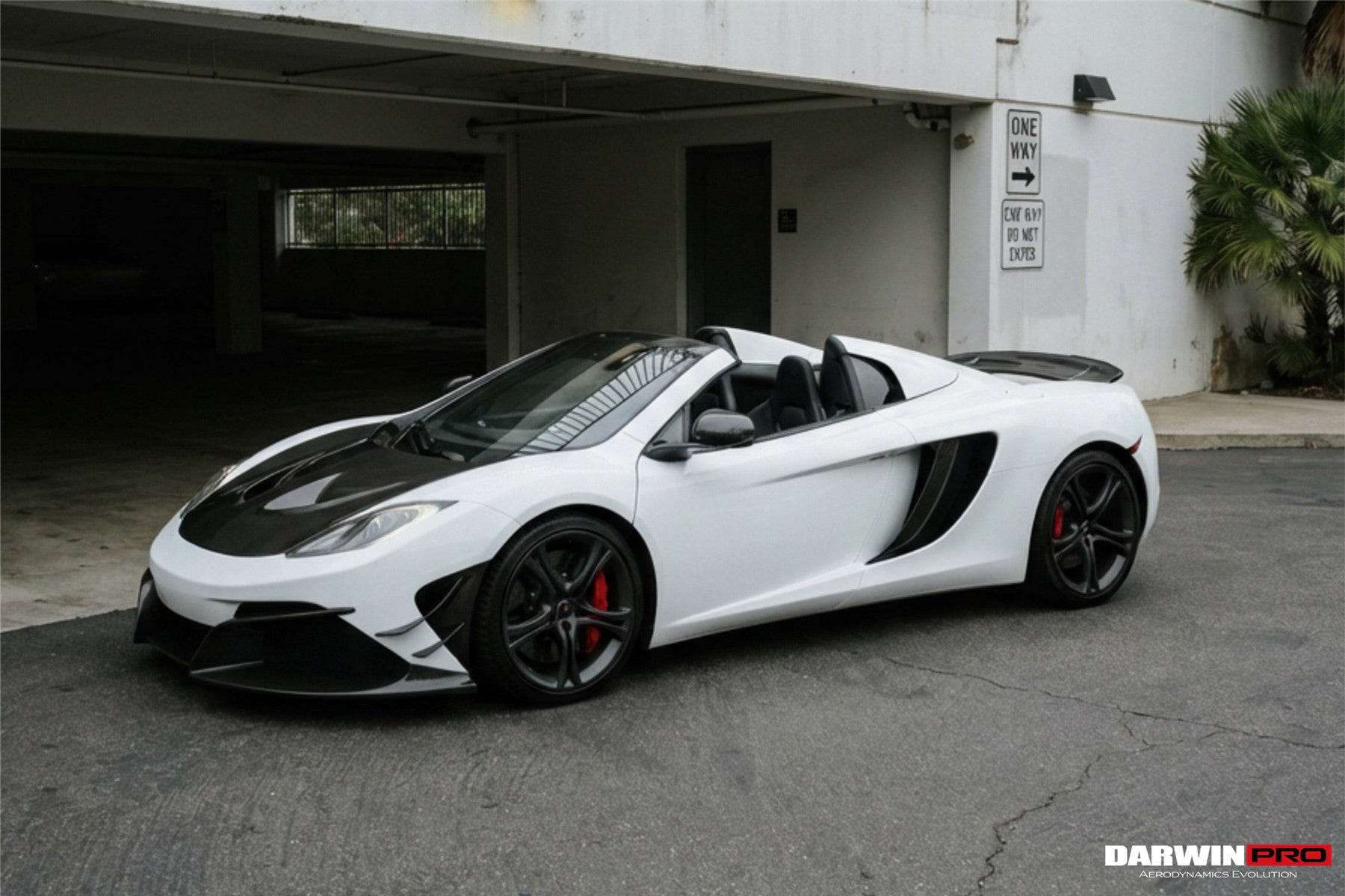 Parachoques delantero DarwinPRO Rebel Performance Style de fibra de carbono parcial con borde | McLaren MP4, 12C (2011-2014)