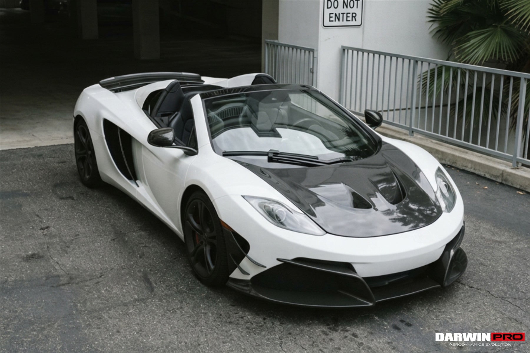Parachoques delantero DarwinPRO Rebel Performance Style de fibra de carbono parcial con borde | McLaren MP4, 12C (2011-2014)