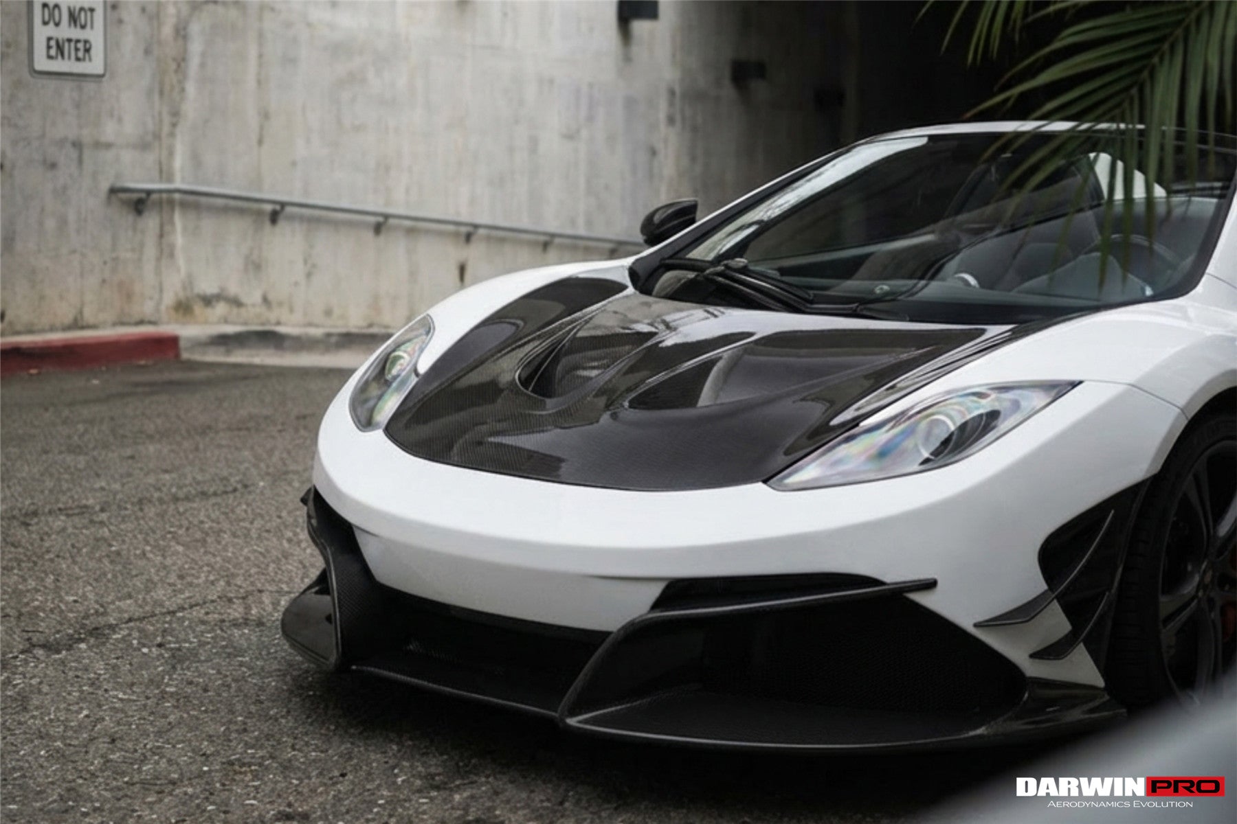 Parachoques delantero DarwinPRO Rebel Performance Style de fibra de carbono parcial con borde | McLaren MP4, 12C (2011-2014)
