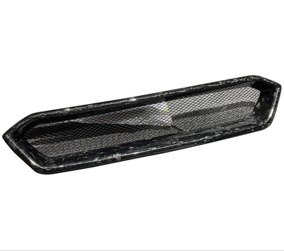 Forged carbon fiber grill on a white background