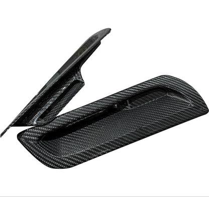 Close-up of GR Corolla front bumper air ducts.