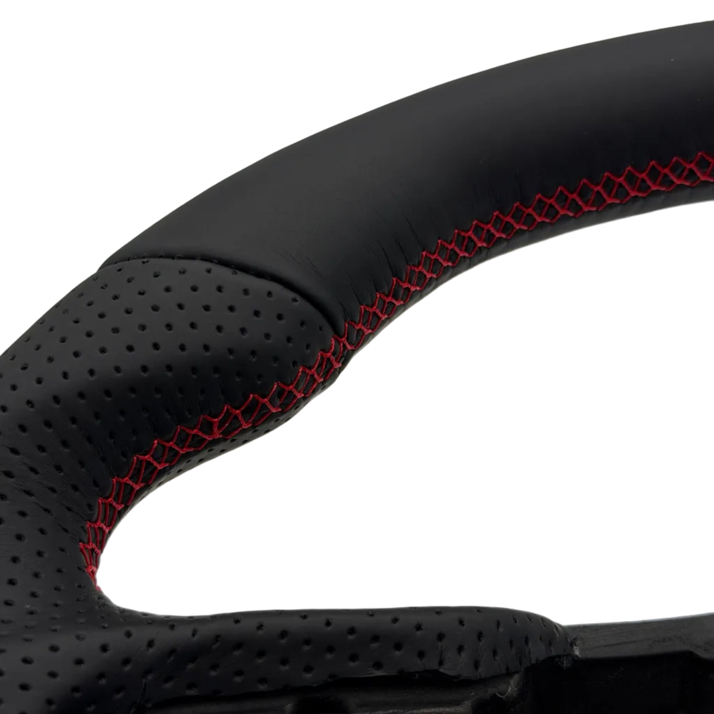 Close-up of a black perforated leather steering wheel rim with red contrast stitching, shown against a white background.