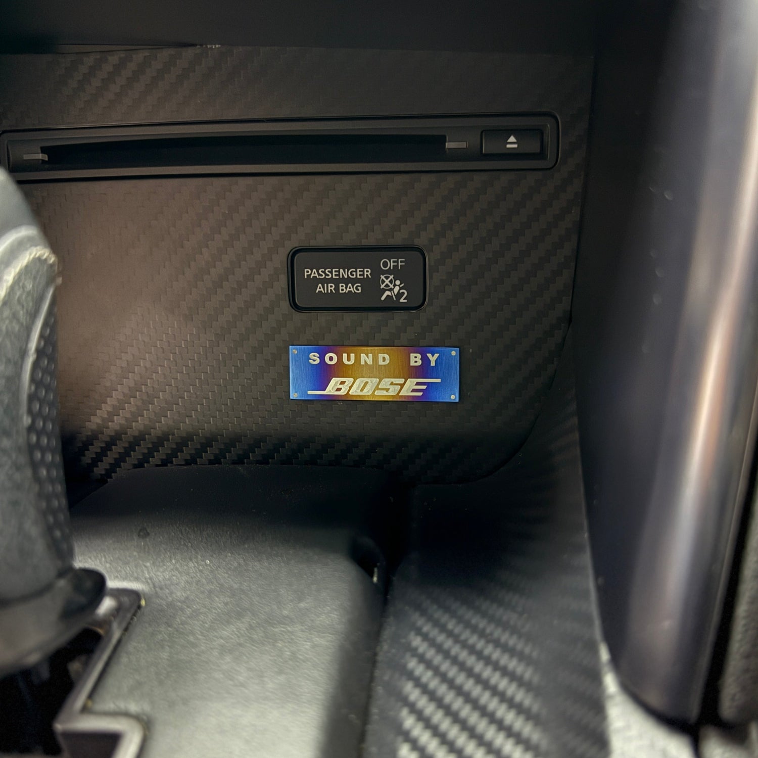 Car interior with Bose sound system panel