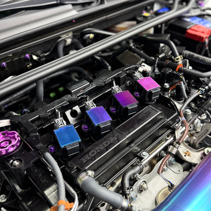 11th Gen Honda Civic Si ignition coils with JDC titanium coil plaques in our signature "Freaktanium" color gradient.
