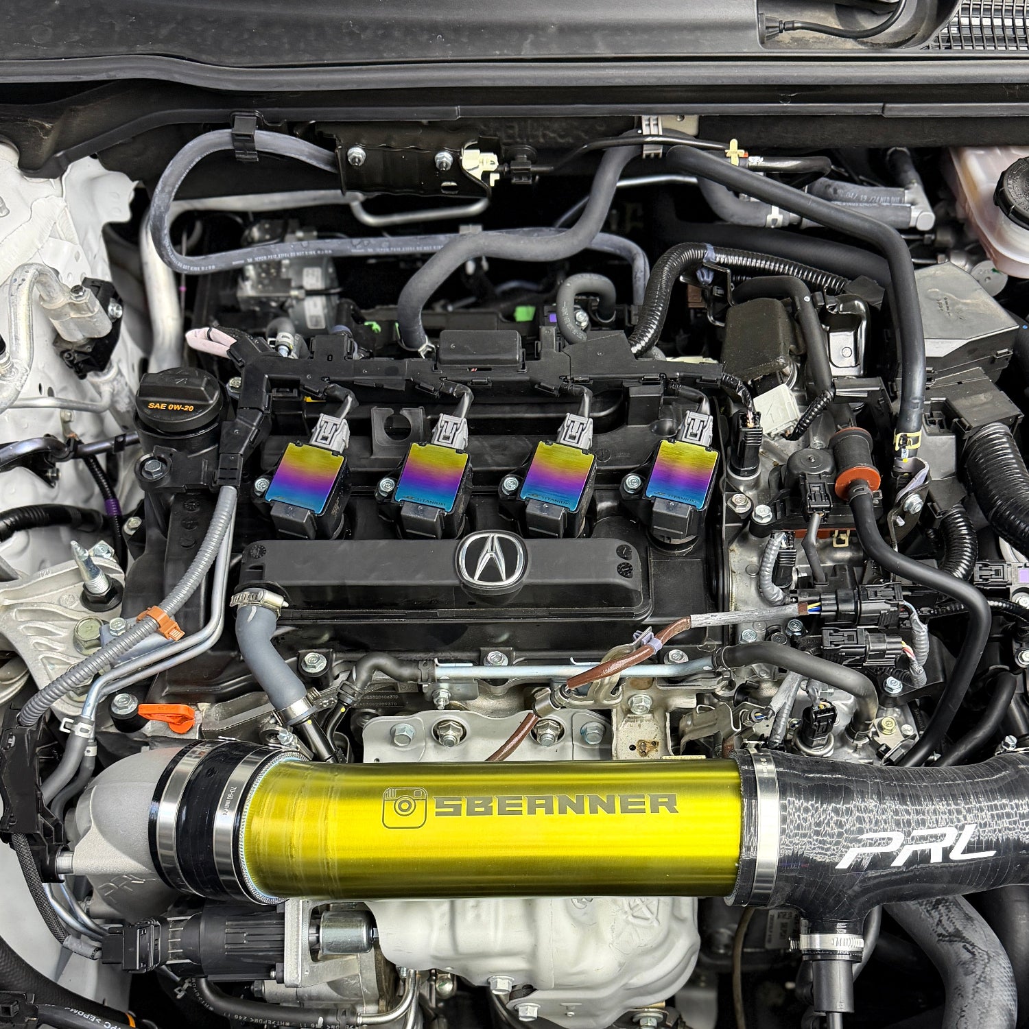 Acura Integra A-Spec ignition coils with JDC titanium coil plaques in our signature "Freaktanium" color gradient.