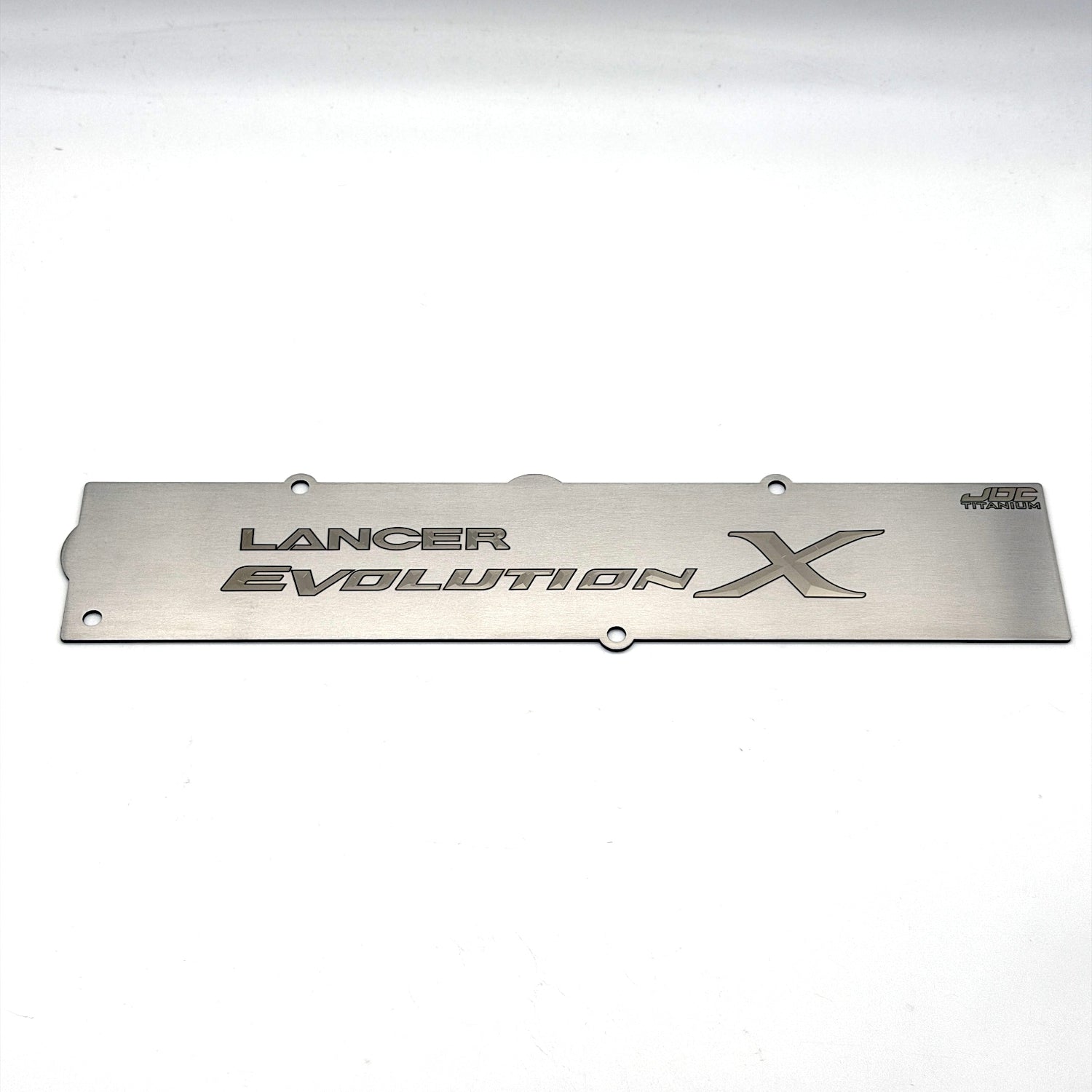 Bare titanium spark plug cover for Evolution X with a bare logo and dark outline.