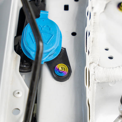 Washer fluid cap with gradient freaktanium titanium hardware replacing the plastic pop clip.