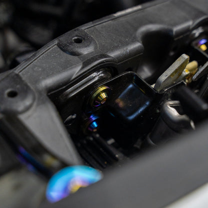 Gradient freaktanium titanium hardware installed on a white Acura Integra A-Spec