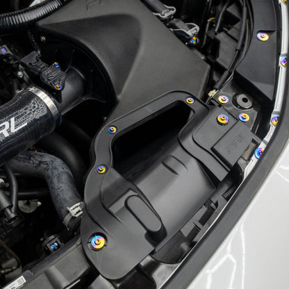 Gradient freaktanium titanium hardware installed on a white Acura Integra A-Spec