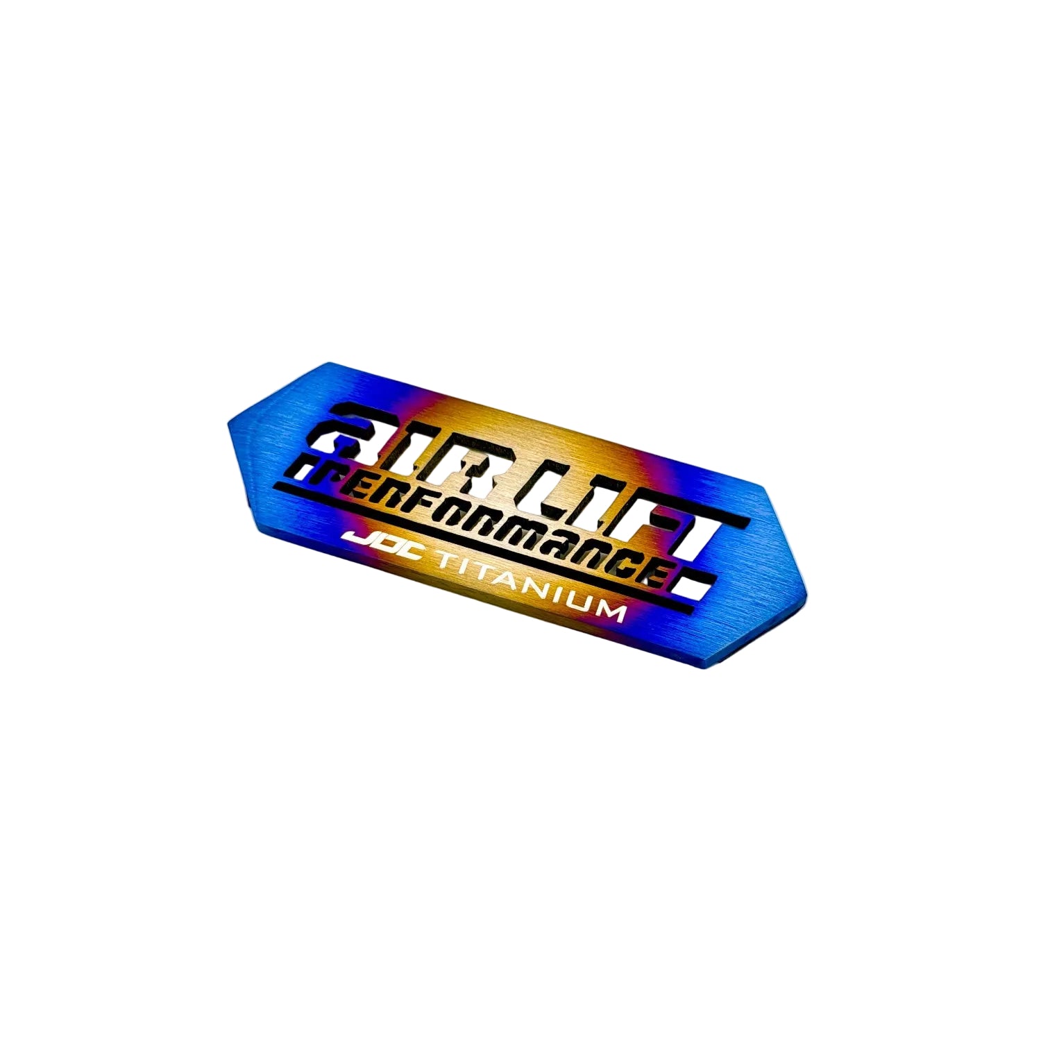 JDC Titanium ALP4 Manifold Badge in a burnt finish with cut-through Design