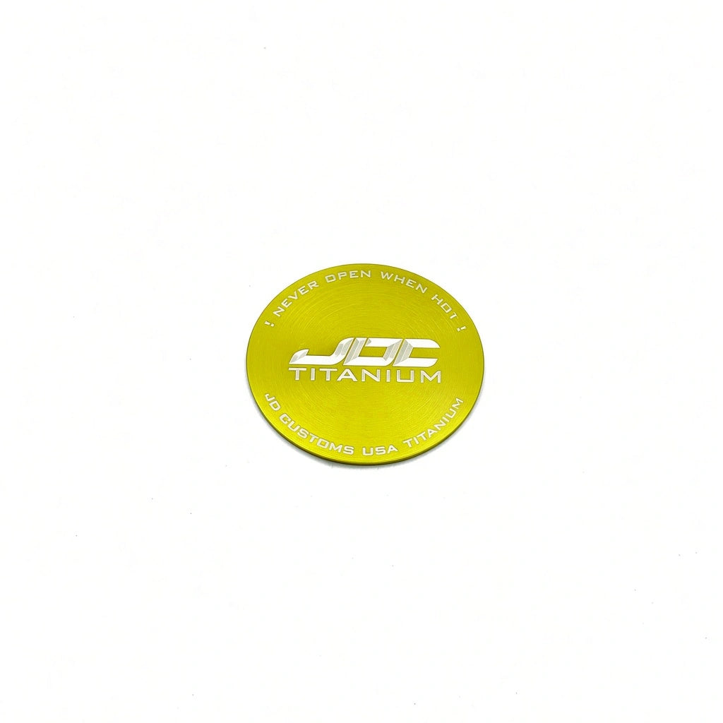 JDC Titanium Radiator Cap Plaque | Universal — Gold — JDC Titanium Logo