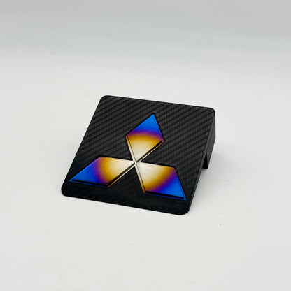 Carbon fiber printed 3D JDC Ashtray Delete with a Mitsubishi diamond star logo in burnt titanium.
